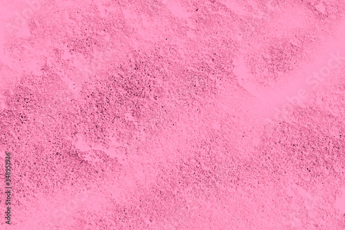 Pink background. Painted plaster. Design.