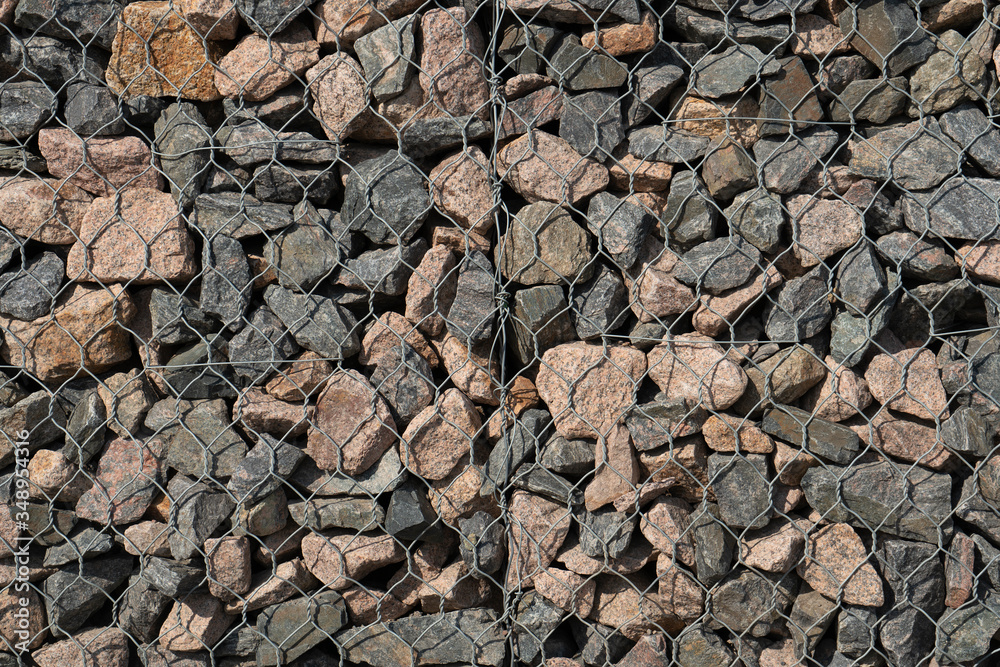 Gravel wrapped in steel mesh, texture for your background. Gravel wrapped in steel mesh, texture for your background.