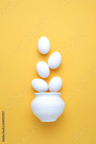 Eggs,Flat lay composition with chicken eggs on color background, space for text photo