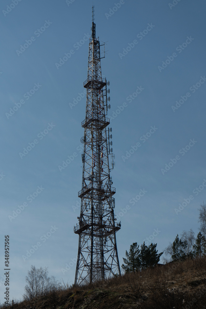 Radio transmitting tower with transmitters. Radio transmitting tower with transmitters.