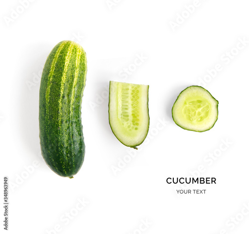 Creative layout made of cucumber on the white background. Flat lay. Food concept.  photo