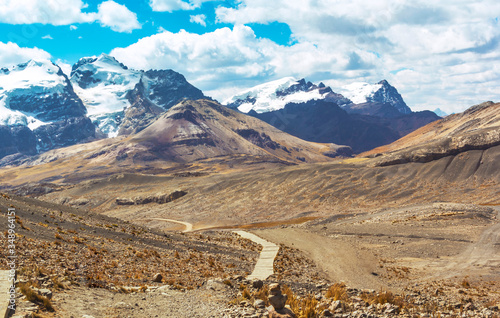 Beautiful trail from the mountain range in the Andean mountains to the Pastoruri glacier, in the Huascarán National Park, Huaraz / Peru. Tropical glacier at 5200 meters above sea level.
 photo