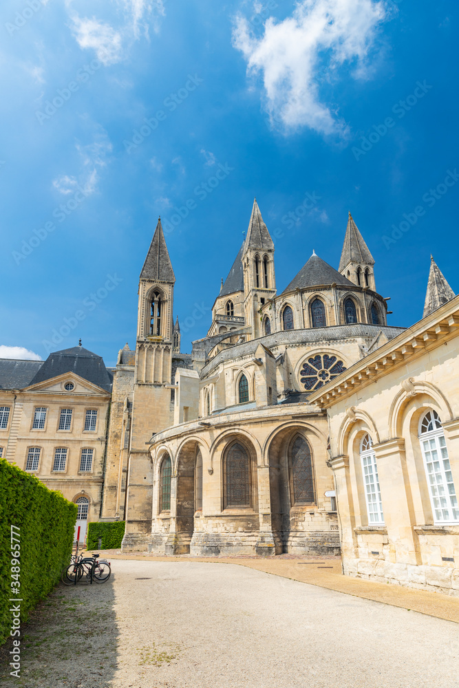 Medieval Abbey of Saint Etienne flying buttresses and towers in Caen, Normandy, France