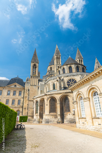 Medieval Abbey of Saint Etienne flying buttresses and towers in Caen, Normandy, France © Dmitry Tonkopi