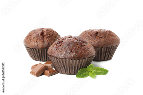 Delicious chocolate and muffins isolated on white background