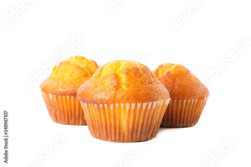 Delicious tasty muffins isolated on white background