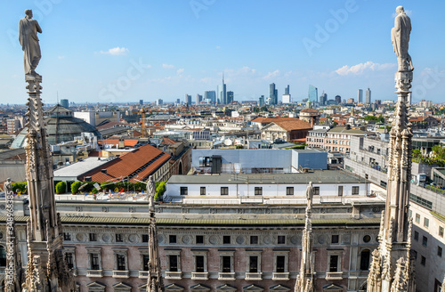 View of on modern business district of Porto Nuovo with high skyscrapers from roof of famous gothic cathedral Duomo, Milan, Italy