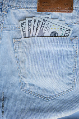 Money in a jeans pocket