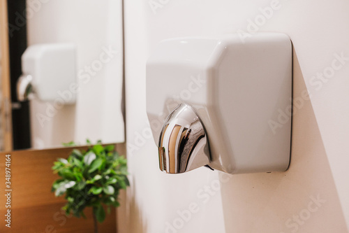 Hand Air Dryer in public WC or restroom