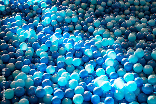 The texture of light and dark blue plastic balls.