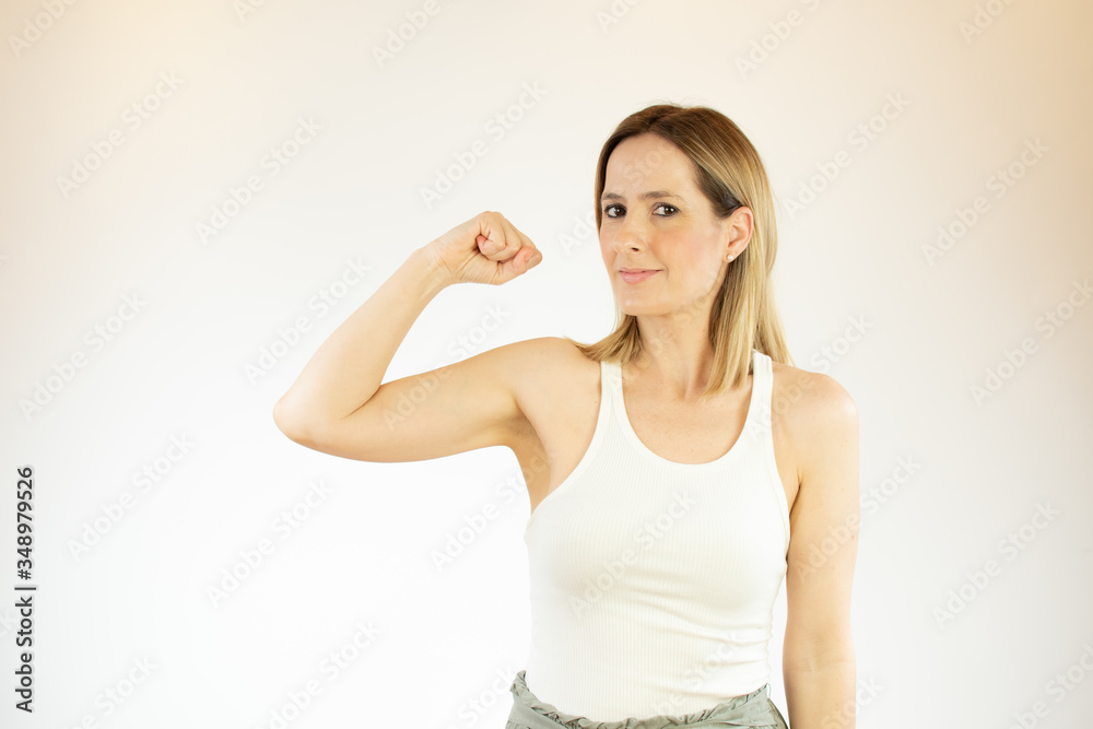 Beautiful woman making gesture with her arm Beautiful woman making gesture with her arm