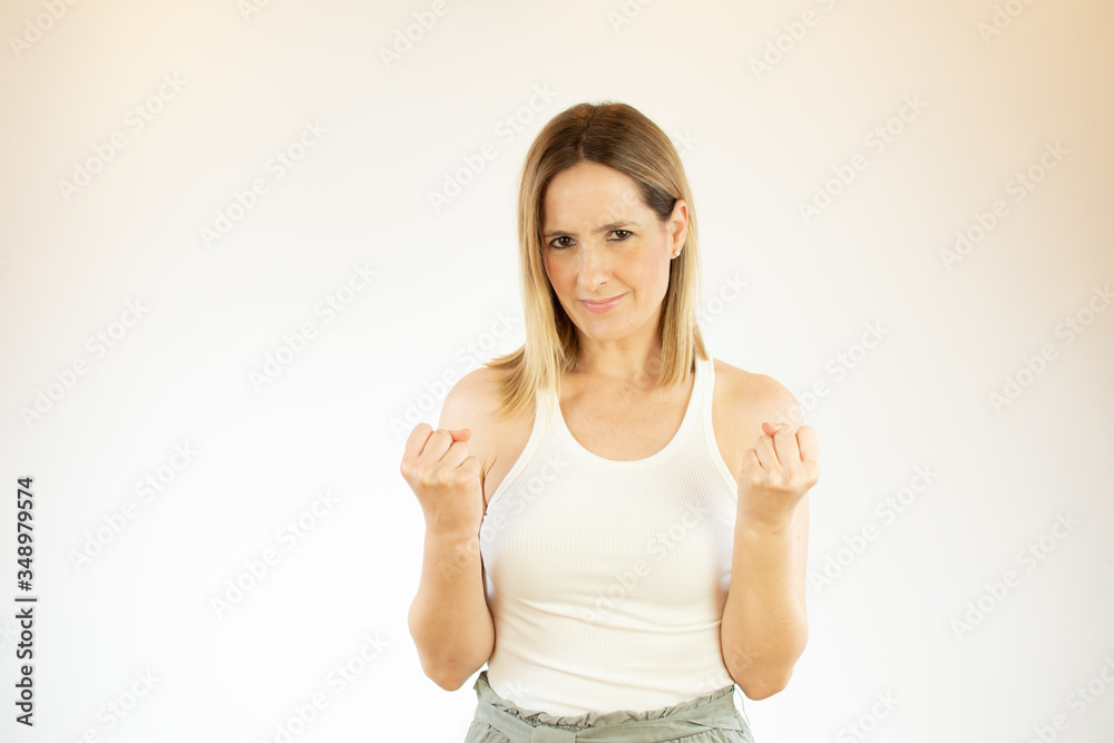 Beautiful woman doing victory gesture with arms Beautiful woman doing victory gesture with arms
