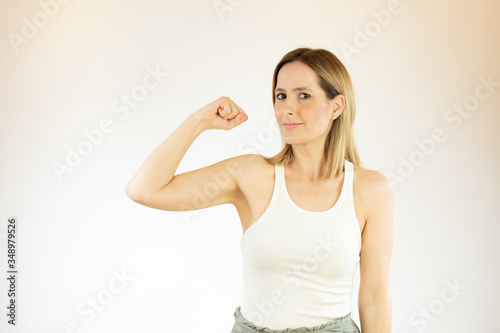 Beautiful woman making gesture with her arm