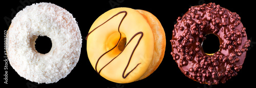 Set of glazed donuts with sprinkles on a black background