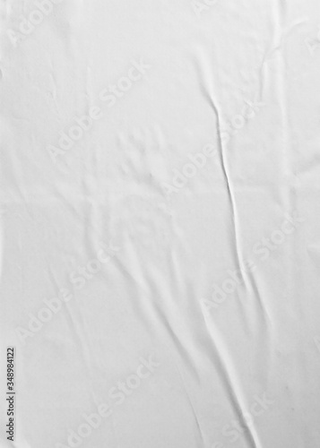 Glued paper for poster texture. Blank white crumpled and wrinkled paper template for background. Matted wet paper wrinkled for mockup posters