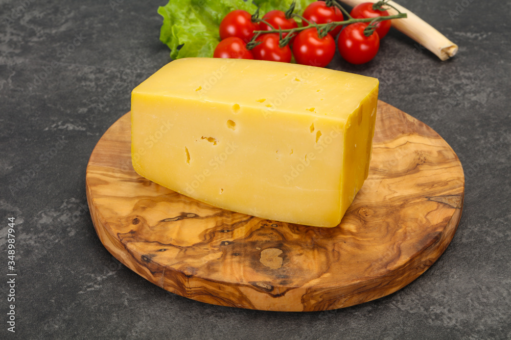 Hard yellow tasty cheese brick Hard yellow tasty cheese brick