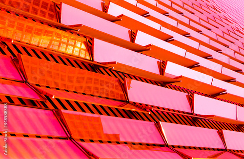 red glass louvers on building