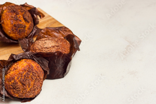 Different homemade muffins with chocolate and cacao and baking. Copyspace.
