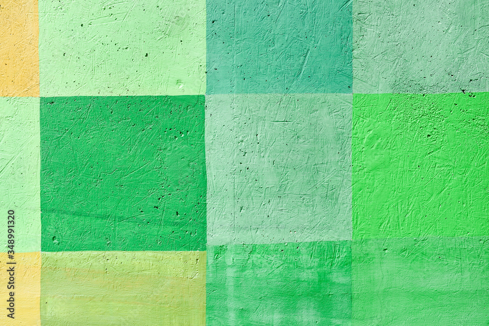 Fototapeta premium Concrete painted wall; square abstract background, with green color prevailing