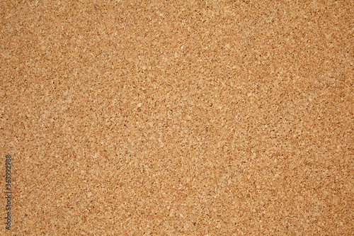 Brown / yellow color of cork board. Textured wooden background. Cork board with copy space. Notice board or bulletin board image. 