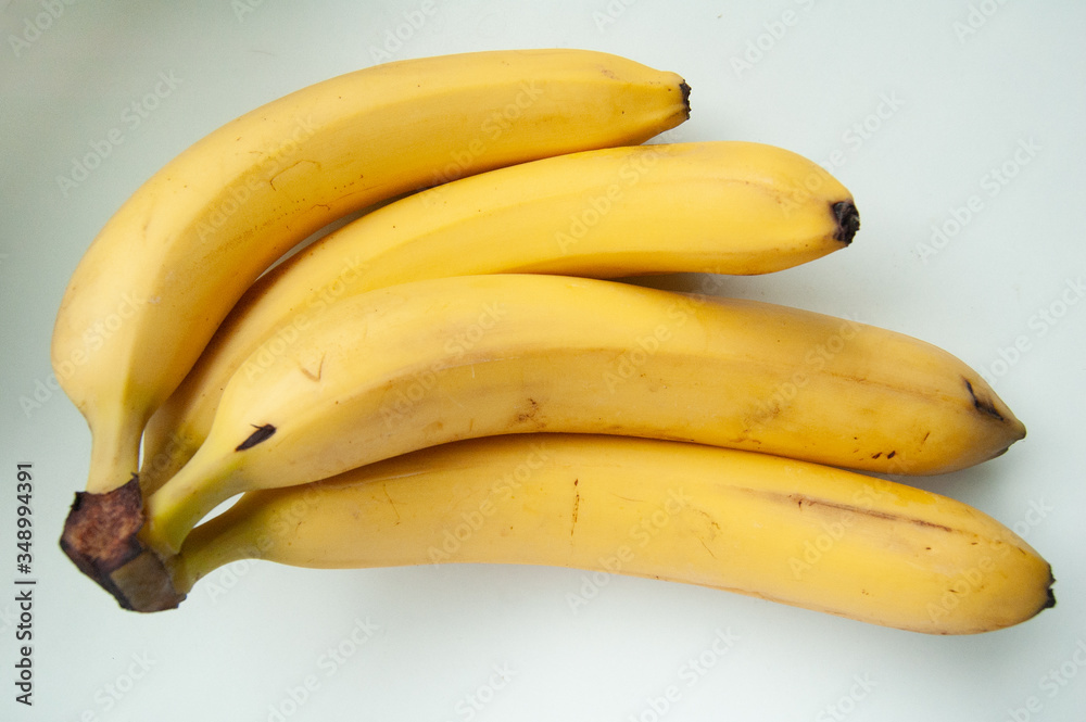 bunch of  organic yellow bananas