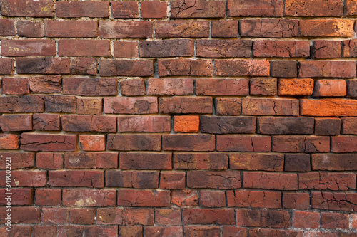 Close up of old red brick wall
