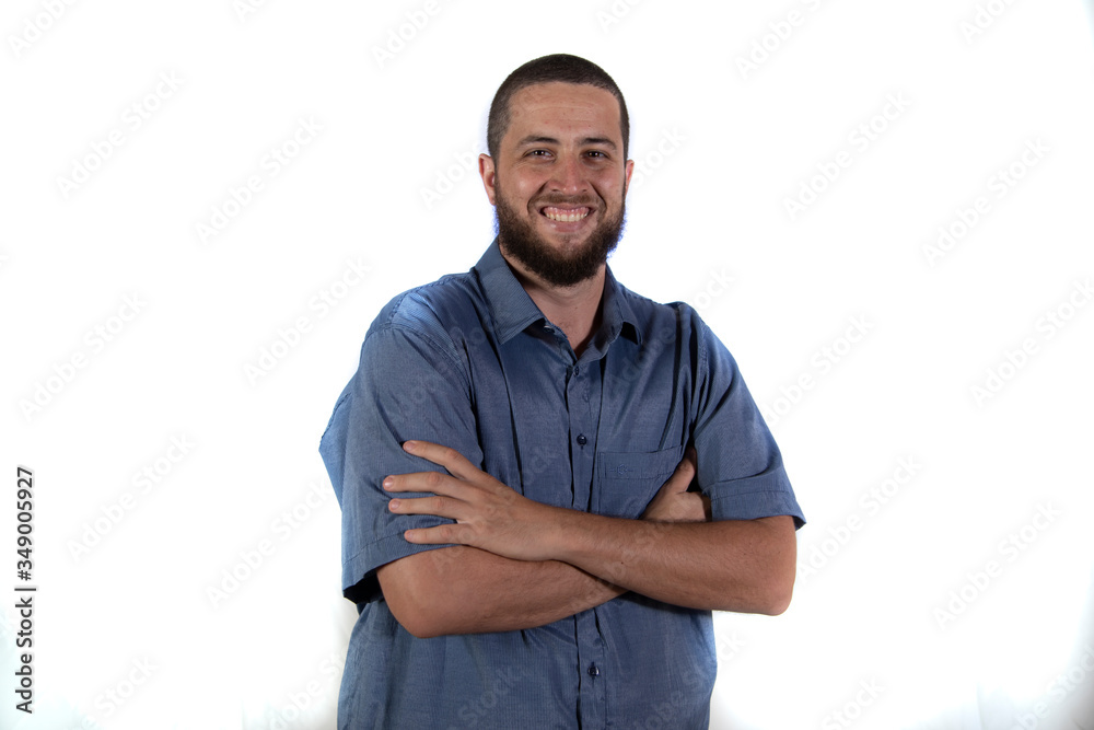 Man with hands on hips on white background