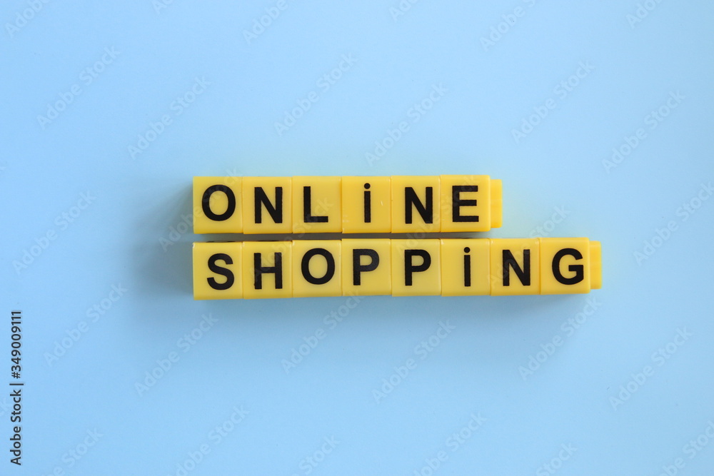 online shopping inscription of yellow cubes on a blue background online shopping inscription of yellow cubes on a blue background