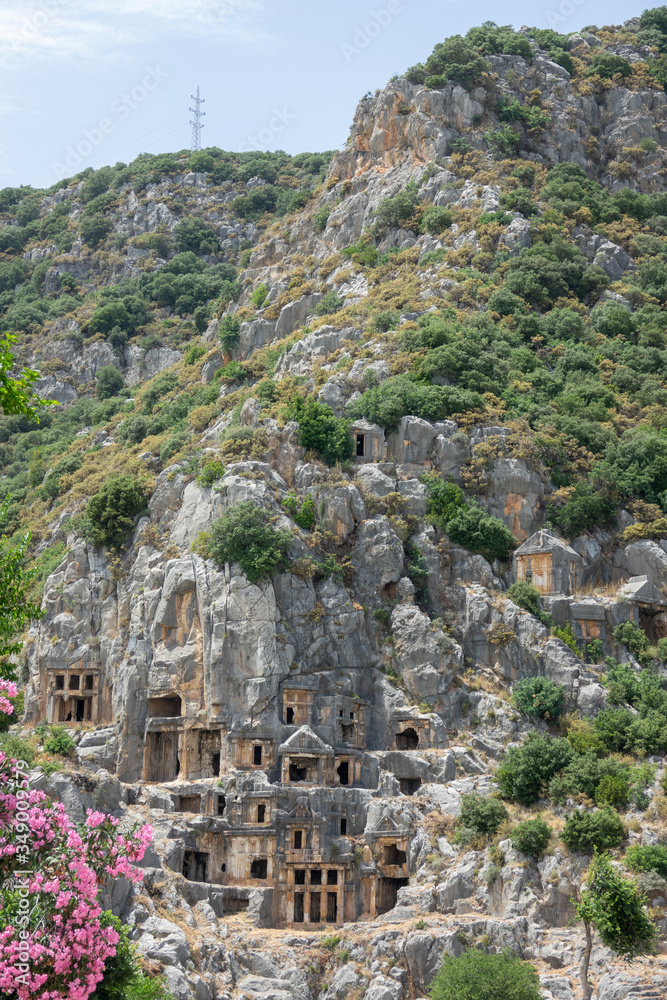Naklejka premium Necropolis of Lycian rock-cut tombs of the ancient city of Myra in Turkey