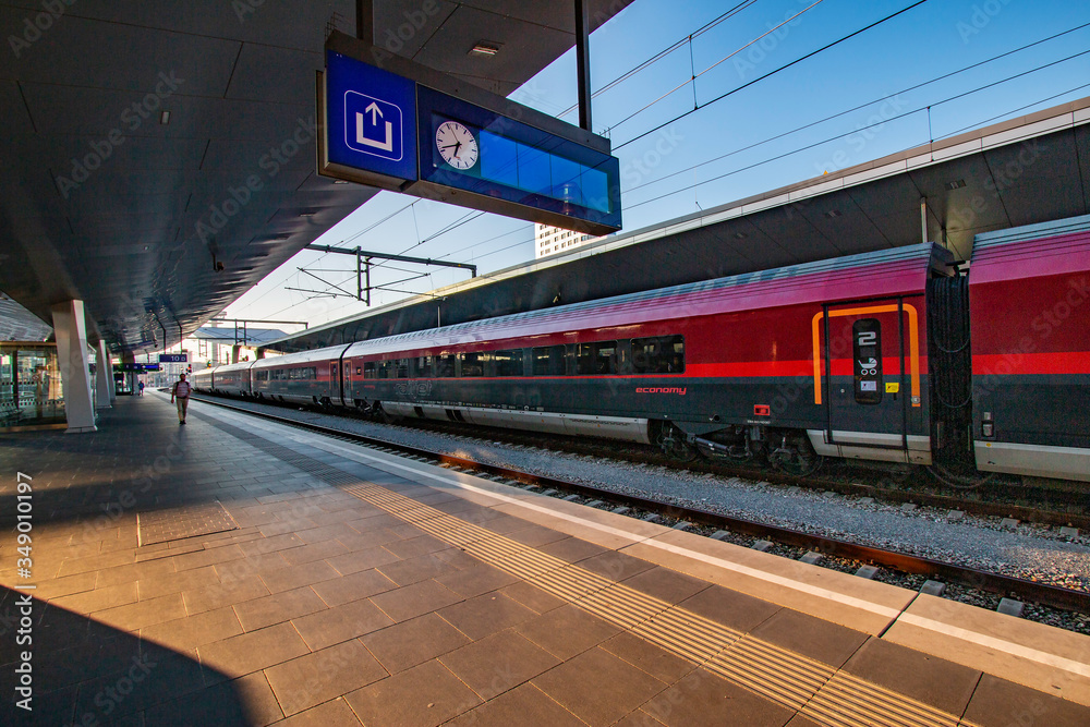 A Railjet train is preparing to depart from the station in Vienna, Austria