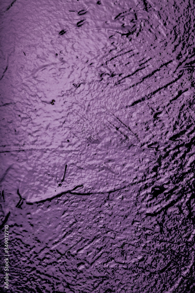 Purple shines on black wall background texture Purple shines on black wall background texture