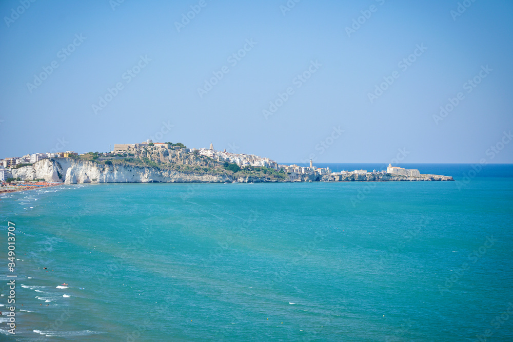 panoramic landscape of the beach and the white cliffs of Vieste, Gargano peninsula, Apulia, Italy