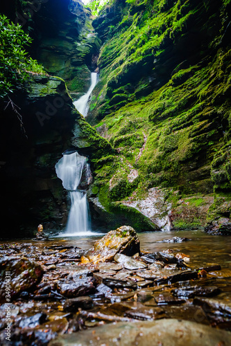 Small waterfall in St. Nectan’s glen in Cornwall, UK photo