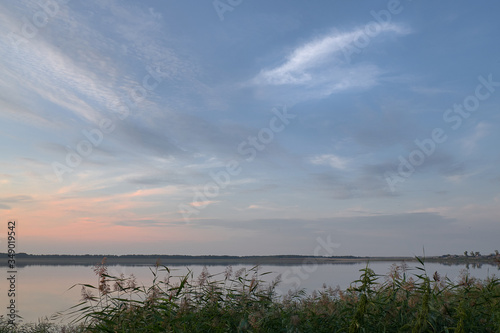 blue sky and evening lake