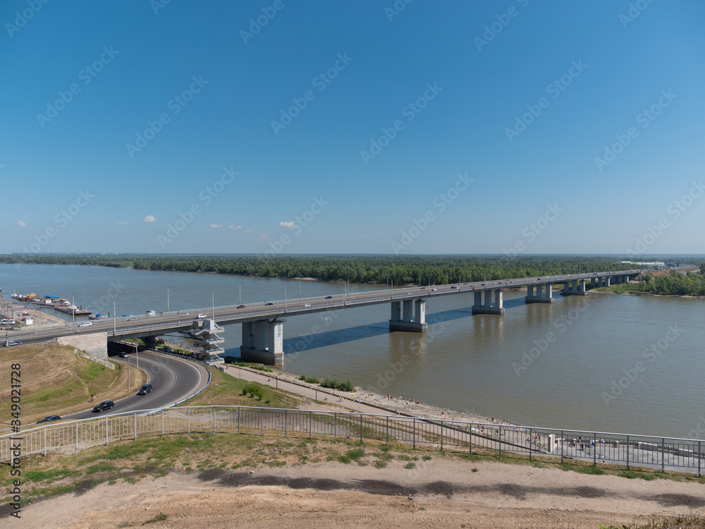 Bridge with cars at the entrance to Barnaul Russia