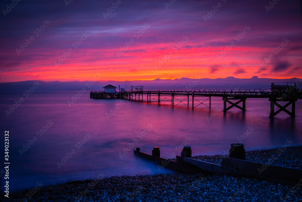 Old pier in Totland Bay at the Isle of Wight by night, UK