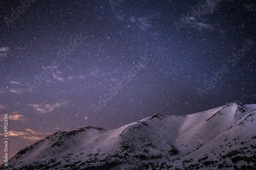 starry sky over the mountains in Alaska