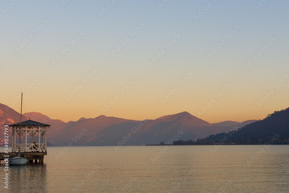 sunset over the quiet waters of Lake Iseo