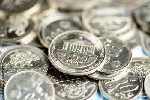 Uzbekistan coins soums A stack of Uzbek coins, sums. 500, 200, 100 and 50 soums