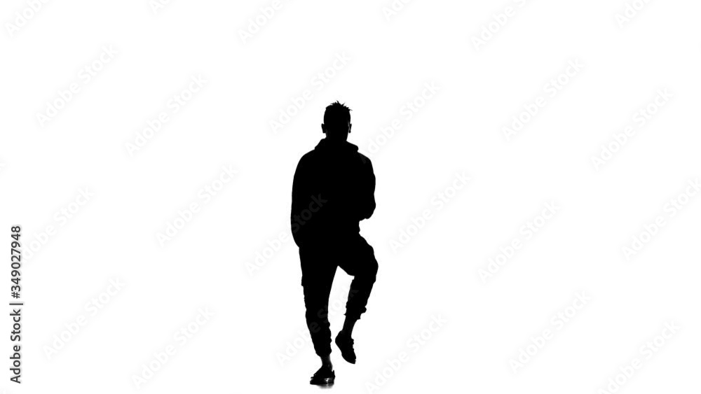 black silhouette on a white background, young handsome man vigorously dancing hip hop, freestyle, street dance, performs complex movements, slow motion black silhouette on a white background, young handsome man vigorously dancing hip hop, freestyle, street dance, performs complex movements, slow motion