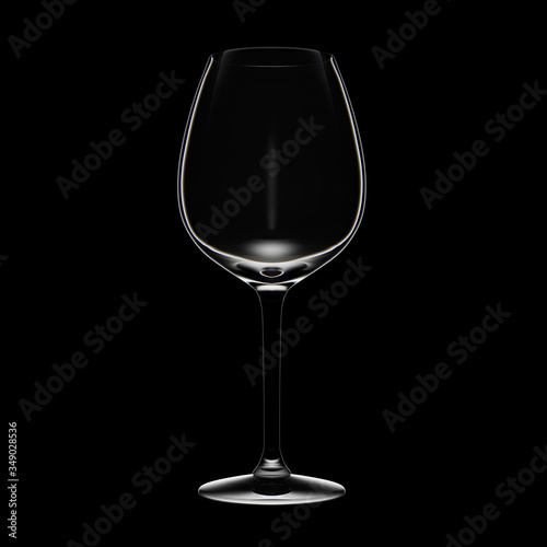 White wine glass on black background. Low key light