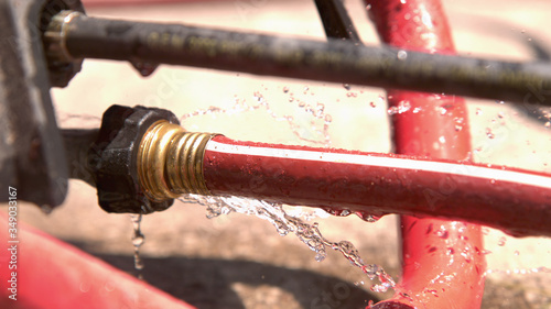 Water leaking at sealing point from hose to pressure washer.