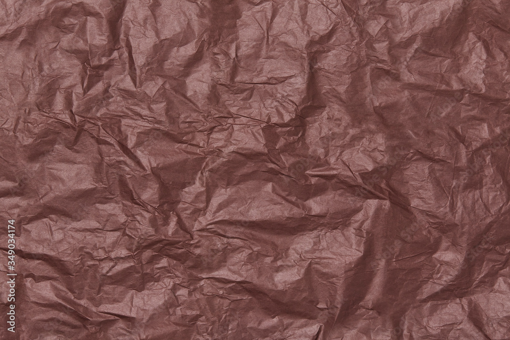 crumpled brown and burgundy craft paper texture, crumpled paper background, chocolate rich color, vintage mood crumpled brown and burgundy craft paper texture, crumpled paper background, chocolate rich color, vintage mood