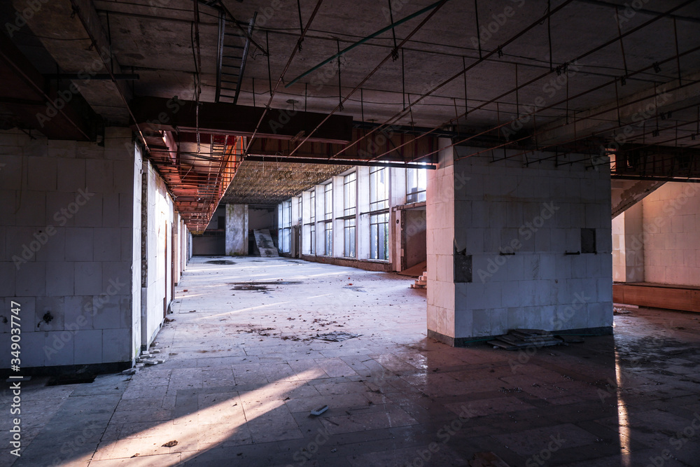Ruins of abandoned buildings in 1986. Soviet architecture in Chernobyl. Danger of infection of people with the virus, radiation. Scary Grunge Background Ruins of abandoned buildings in 1986. Soviet architecture in Chernobyl. Danger of infection of people with the virus, radiation. Scary Grunge Background
