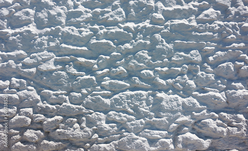 Texture of whitewashed stone-work photo