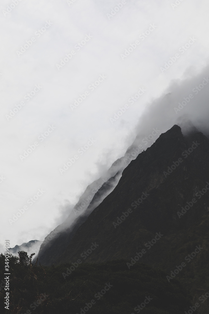 andean mountains in the clouds