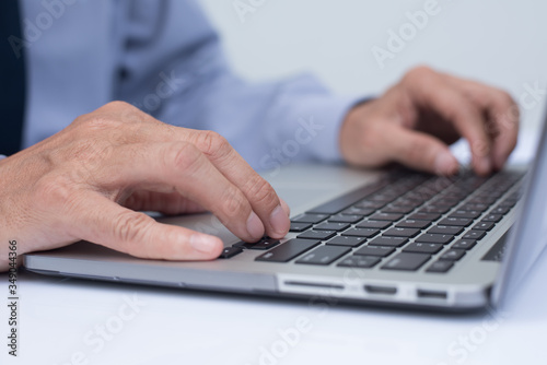 Businessman working on laptop computer computer