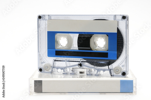 Compact audio tapes for magnetic recording on a white background.Compact cassettte