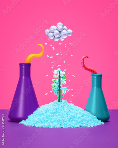 Laboratory Flasks with Conceptual Science Project on Purple Surface with Pink Background (ID: 349048765)
