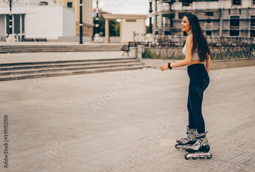 Urban girl roller skating © qunica.com
